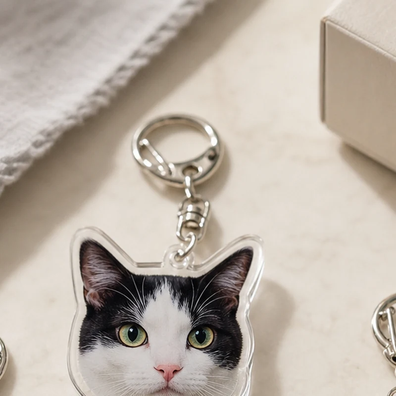 silver clasp detail on a custom acrylic cat photo keychain